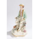 19th Century Staffordshire pottery figure, of a seated wearing a hat and a spotted dog to his lap,