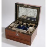 Victorian walnut vanity case, with mother of pearl set top and escutcheon above the hidden drawer,