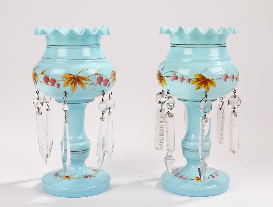 Pair of Victorian blue glass lustres, with hanging clear prismatic drops