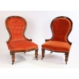 Near pair of Victorian mahogany button back chairs, the arched top rail with stuff over back and