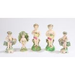 19th Century porcelain figures, to include two pairs of figures bearing baskets of flowers and a