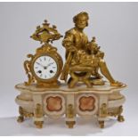 French 19th Century gilt metal and alabaster clock, with a seated figure holding an urn with the