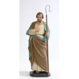 20th Century bisque statue depicting St John, holding a shepherds crook and wearing a blue, grey and