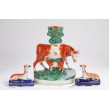 19th Century Staffordshire pottery, to include a large spill vase with a cow and calf, 28cm high,