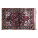 Fine Persian silk carpet, with foliate pattern lozenge centre, foliate ground and borders, silk on