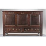 Circa 1766 oak mule chest. The plank rectangular hinged top opening to reveal storage space,