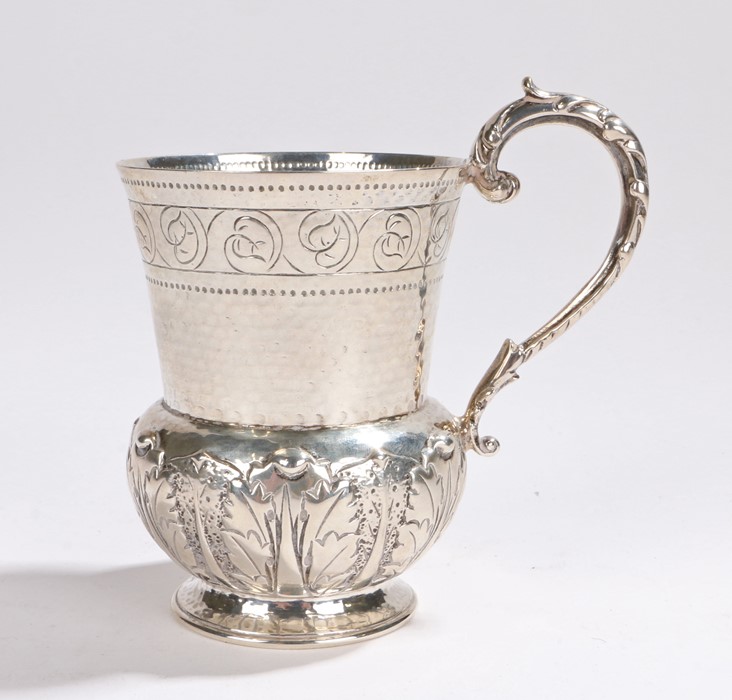 Victorian silver cup, London 1900, the hammered cup with flower and thistle design and an acanthus