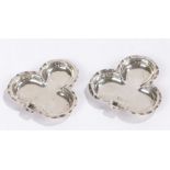 Pair of silver trefoil shaped dishes, hallmarks rubbed, 1.1ozHallmarks illegible, surface marks