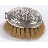 Dutch silver brush, the handle with embossed depiction of figures on a boat, with hanging loopSome