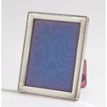 Elizabeth II silver picture frame, Birmingham 1991, maker W I Broadway & Co, with gadrooned border