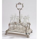 Silver plated cruet stand, with six glass bottles with stoppers within the silver plated frame on