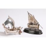 Silver model of a sailing ship, stamped 925 to hull, mounted on an oval ebonised plinth base, silver