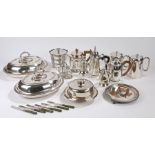 Silver plated objects, to include two tureens and covers, ice bucket and cover, tea and coffee pots,