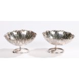 Pair of Chinese silver dishes, Qing dynasty, early 20th Century, maker Wang Hing, the pair of dishes