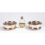 Pair of plated on copper coasters with turned wooden bases, plated and clear glass hip flask with