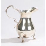 George V silver cream jug, London 1915, maker Harry Freeman, with acanthus leaf capped double scroll