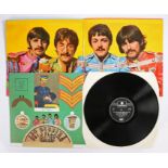 The Beatles - Sgt, Peppers' Lonely Hearts Club Band ( PCS 7027 ). repressing with cut-out insert.