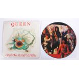 2 x Queen singles. It's A Hard Life ( 12QUEENP 3 ), 12" picture disc. I'm Going Slightly Mad ( QUEEN