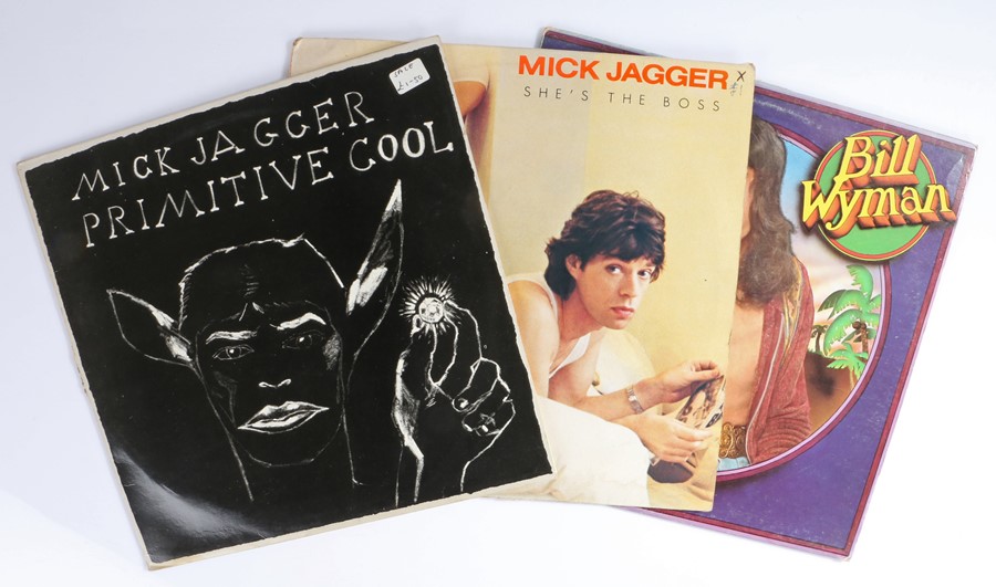 3 x Rolling Stones related LPs. Mick Jagger (2) - She's The Boss, Primitive Cool. Bill Wyman -