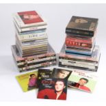 A collection of 28 Elvis Presley CDs and 11 DVDs.VG