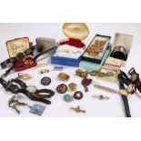 Mixed objects, to include a silver napkin ring, a silver knife, a sovereign scale, badges, watches