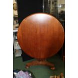 Victorian mahogany breakfast table, the circular tilt top raised on an octagonal tapering stem,