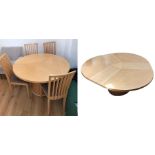 Skovby SM32MB maple dining table, the circular top with rotating action and concealed triple