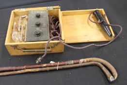 Osborne Garrett & Co Ltd electrotherapy kit, housed in original box, two walking sticks, one with