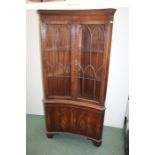 George III style inverted bowfront corner cabinet, with astragal glazed doors and cupboards, 91cm