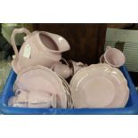 Pottery service, in pink glaze