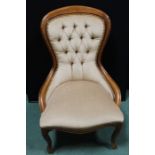 Victorian style button back easy chair, on cabriole legs