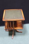 Bevan Funnell Reprodux mahogany veneered revolving bookcase, the tooled leatherette inset top