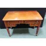 Victorian mahogany writing table, with raised upstand above four frieze drawers and scroll carved