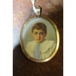 Victorian portrait miniature, of a boy in a white shirt and blue neck tie, oil on ivory
