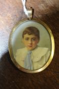 Victorian portrait miniature, of a boy in a white shirt and blue neck tie, oil on ivory
