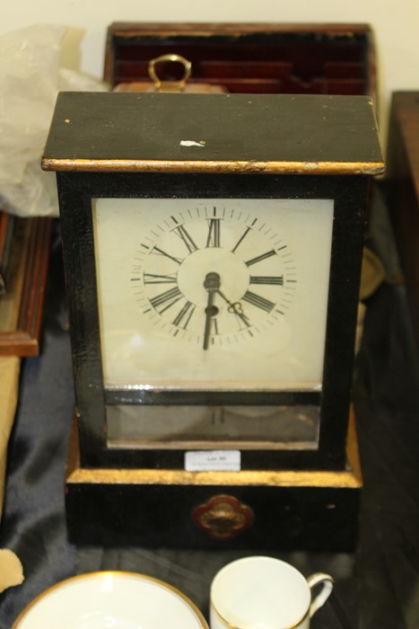 Ansonia American mantel clock, the white dial with Roman numerals, the ebonised case wit an R.A.O.