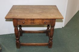 18th Century style oak table, with a rectangular top above a frieze drawer, 68cm wide