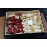 Stained ivory chess set, folding chess board, cased set of gaming tokens/discs (qty)