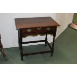 18th Century style oak side table, the rectangular top above a frieze drawer and turned legs, 81cm