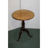 19th Century mahogany occasional table, with a circular top above turned column