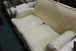 Armchair and settee, in pale green and cream covers