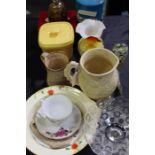 Collection of objects, to include a wade butter dish, a honey pot, vases, glass, advertising tins,