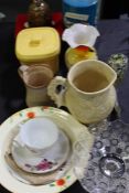 Collection of objects, to include a wade butter dish, a honey pot, vases, glass, advertising tins,