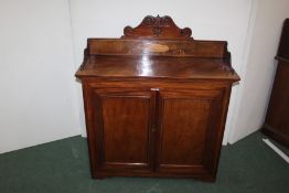 Mahogany chiffonier, with a scroll back and named panel Georgius Fredericus Schoene, the rectangular