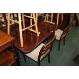 19th Century mahogany drop leaf table, with a rectangular top and two drop leaves