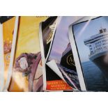 Seven cruise related posters to include Titanic, the Cunard Line, Cunard USA/Canada, two Queen