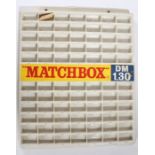 Matchbox DM 1,30 wall hanging display rack, with recesses for 77 cars, 61cm x 73.5cm