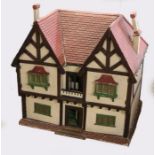 Edwardian style dolls house, with four opening panels to the front and open back, 81cm wide, 79cm