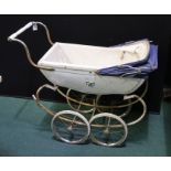 Silver Cross dolls pram, with white bodywork and blue folding canopy, 96cm wide