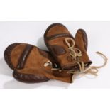 Pair of child's brown leather boxing gloves